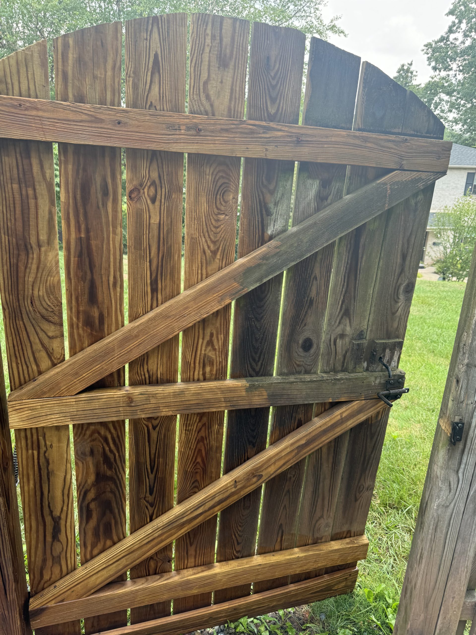 Power Washing of Wooden Gate to remove weathered surface.